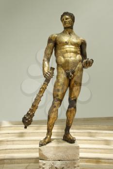 Royalty Free Photo of a Cult Statue of Young Hercules in the Capitoline Museum, Rome, Italy