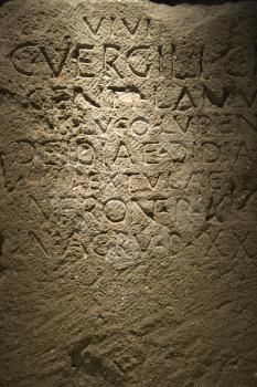 Royalty Free Photo of Script Carved in Stone in Capitoline Museum, Rome, Italy