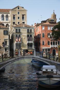 Royalty Free Photo of a Bridge Over a Canal in Venice, Italy