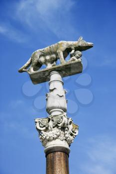 Sculpture of wolf nursing Romulus and Remus.