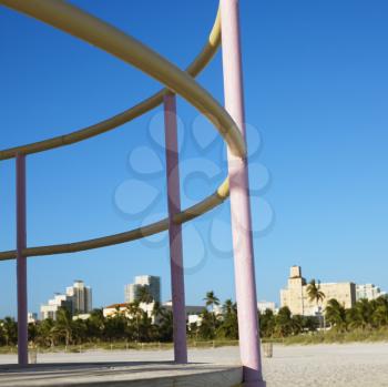 Royalty Free Photo of Pink and Yellow Painted Railings of a Lifeguard Tower on a Beach in Miami, Florida, USA