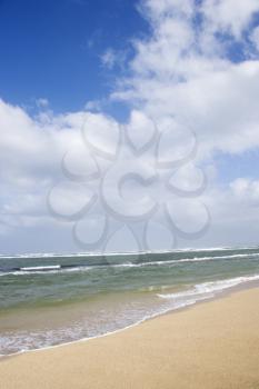 Royalty Free Photo of a Landscape of Waves Lapping on a Beach
