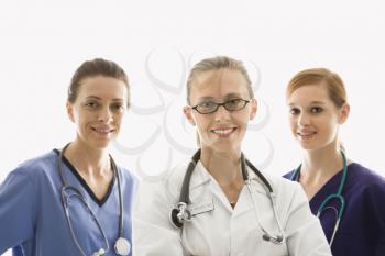 Royalty Free Photo of Female Health Care Workers in Uniforms Standing Against a White Background