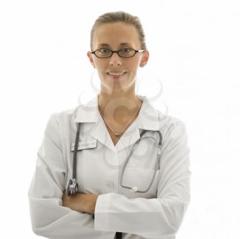 Portrait of smiling Caucasian woman doctor standing against white background.