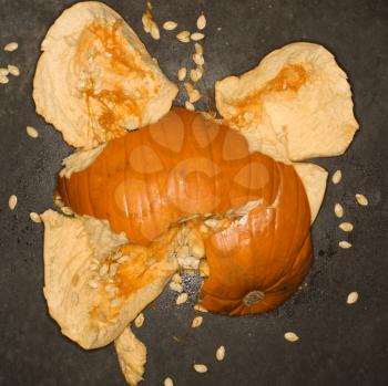 Royalty Free Photo of a Pumpkin Smashed on a Concrete floor