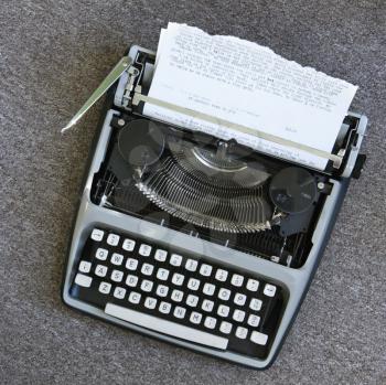 Royalty Free Photo of an Overview of a Typewriter With Paper That Has Been Typed On
