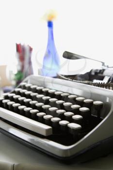 Royalty Free Photo of a Typewriter Sitting on a Counter