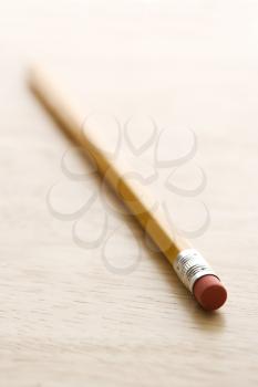 Selective focus of eraser end of pencil.