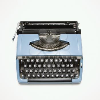Royalty Free Photo of a Blue Vintage Typewriter