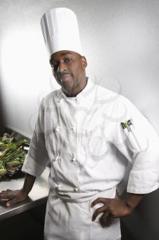 Royalty Free Photo of a Chef Wearing a Uniform