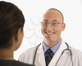 Royalty Free Photo of a Doctor Talking With a Patient