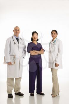 Royalty Free Photo of a Male Physician Standing With Women Doctors