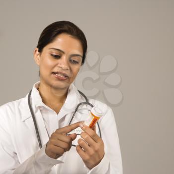 Royalty Free Photo of a Doctor Explaining Medication