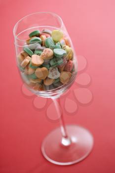 Royalty Free Photo of a Wine Glass Full of Candy Hearts