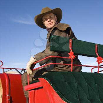 Royalty Free Photo of a man in sleigh 