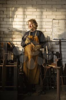 Royalty Free Photo of a Caucasian Male Metal Smith Portrait