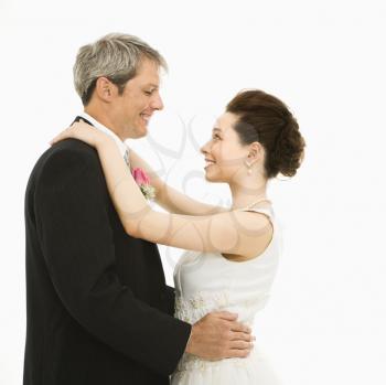 Royalty Free Photo of a Bride and Groom Dancing