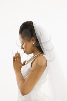 Royalty Free Photo of a Bride Praying 