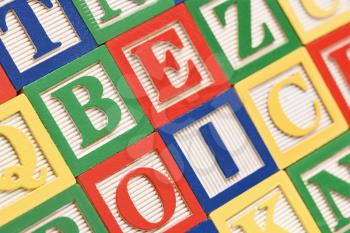 Royalty Free Photo of Alphabet Building Block Toys Neatly Arranged