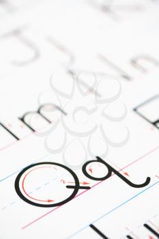 Royalty Free Photo of a Close-up of the Letter Q Handwriting Practice Page