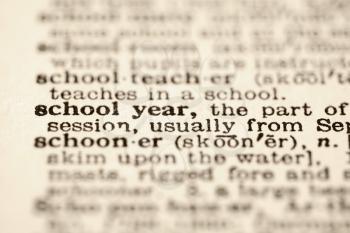 Royalty Free Photo of a Selective Focus of a Dictionary Definition for The Word School Year