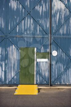 Royalty Free Photo of an Exterior of a Building With a Door and Metal Siding, Australia
