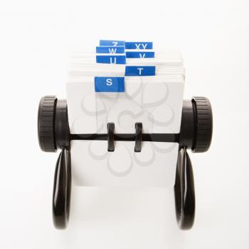 Rolodex with blue letter tabs. 