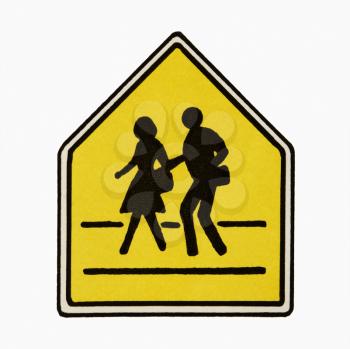 Royalty Free Photo of a Pedestrian Crossing Sign Against a White Background
