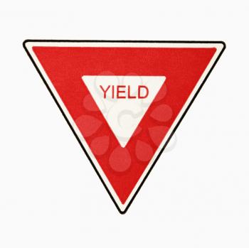 Yield road sign against white background.