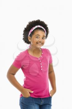 Royalty Free Photo of a Girl Wearing a Headband and Smiling