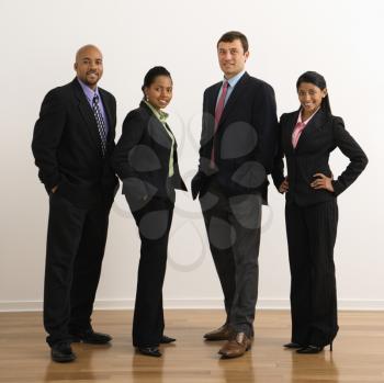 Royalty Free Photo of Businesspeople Standing Smiling