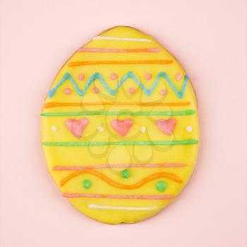 Royalty Free Photo of a Sugar Cookie in the Shape of an Easter Egg With Decorative Icing