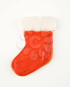 Christmas stocking sugar cookie with decorative icing.