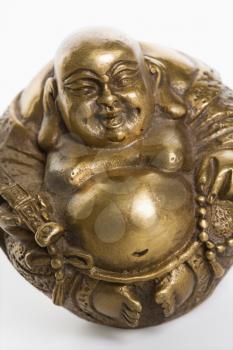 Royalty Free Photo of a Happy Laughing Buddha Brass Figurine