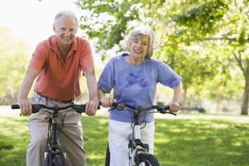 Royalty Free Photo of a Senior Couple Riding Bikes