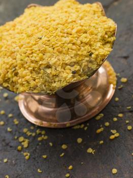 Royalty Free Photo of a Dish of Yellow Mustard Seeds