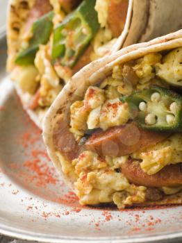 Royalty Free Photo of Goan Style Eggs wrapped in a Chapatti