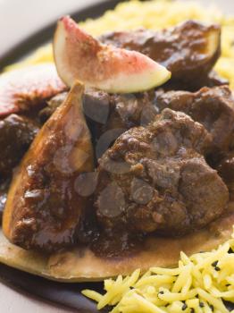 Royalty Free Photo of a Maans Anjeer, Slow Cooked Lamb with Fresh Figs