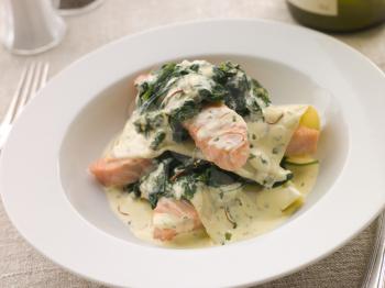 Royalty Free Photo of an Open Lasagna of Salmon and Spinach in a Cream Sauce