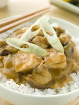 Royalty Free Photo of Chicken and Mushroom Curry With Koshihikari Rice