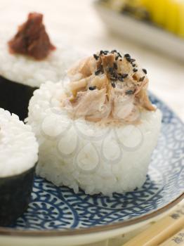 Royalty Free Photo of Sushi Rice Balls With Smoked Mackerel and Umeboshi Paste