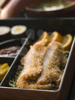 Royalty Free Photo of Tonkatsu Plated With Rice Miso Soup and Pickles
