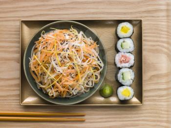 Royalty Free Photo of Daikon and Carrot Salad With Sesame Sushi and Wasabi From Above