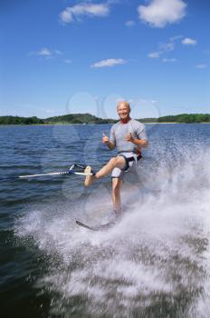 Royalty Free Photo of a Man on Waters Skis