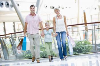 Royalty Free Photo of a Young Family at a Mall