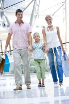 Royalty Free Photo of a Young Family Shopping