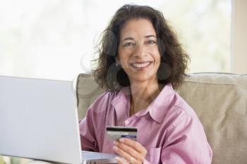Royalty Free Photo of a Woman Making an Online Purchase