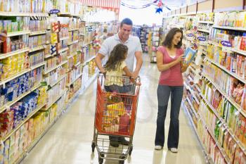 Royalty Free Photo of a Family Grocery Shopping