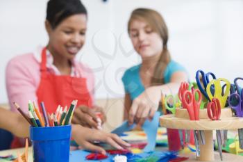 Royalty Free Photo of a Teacher and Student in Art Class