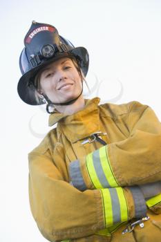 Royalty Free Photo of a Female Firefighter in a Bunker Suit